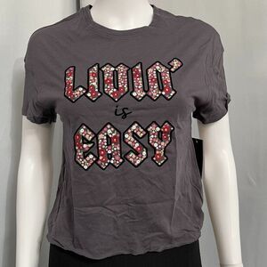 Carbon Copy Juniors’ “Livin’ Is Easy” Graphic T-Shirt Tops
